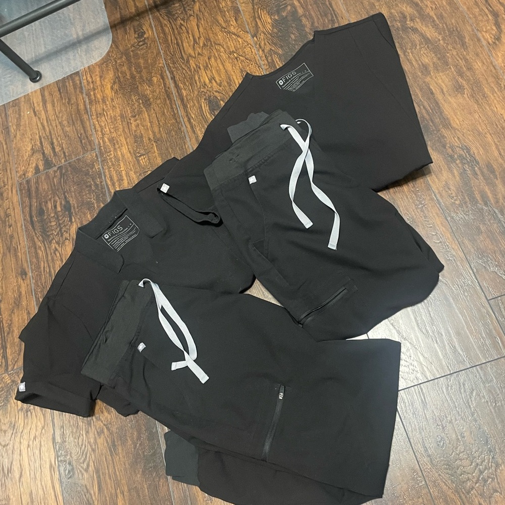 Two pairs of FIG scrubs. Size small. Black